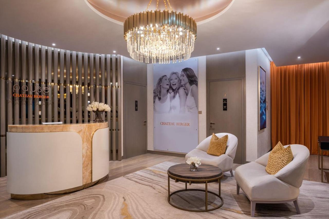 Paramount Hotel Midtown Dubai Eksteriør bilde The interior of the salon
